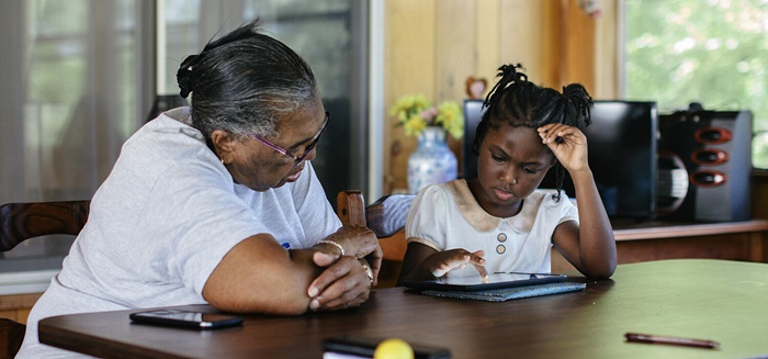 a parent helping a child with homework how to help your child with homework without doing it for them